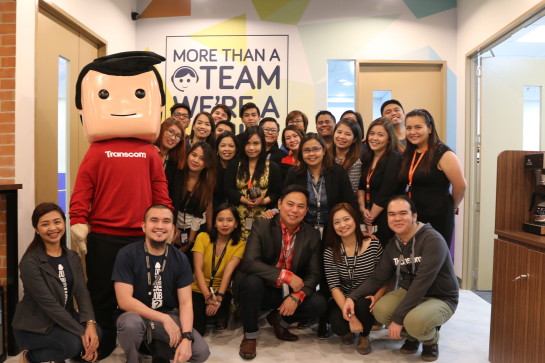 Sourcing and Recruitment Team with Cesar (Transcom's Mascot)